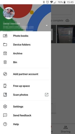 Menu interface of the Google Photos app showing various options like photo books, archive, and settings.